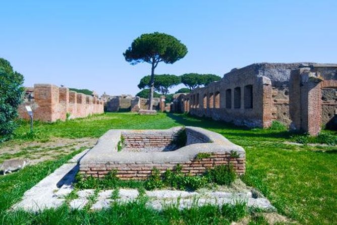 Ancient Ostia Antica Semi-Private Day Trip from Rome by Train with Guide - First stop at the ruins: Decumanus Maximus and a port city in your head