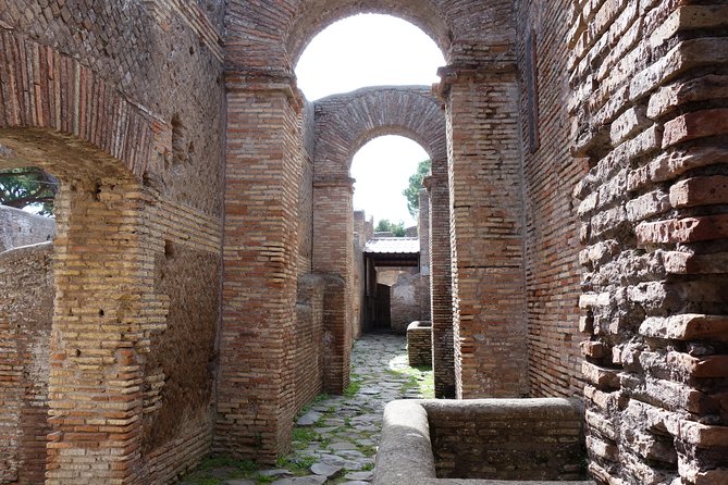Ancient Ostia Antica Semi-Private Day Trip from Rome by Train with Guide - What “semi-private up to 12” changes for your day