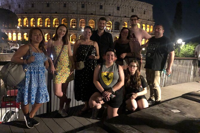 Ancient Rome at Twilight Walking Tour - Piazza del Colosseo, final view of the Colosseum lit up