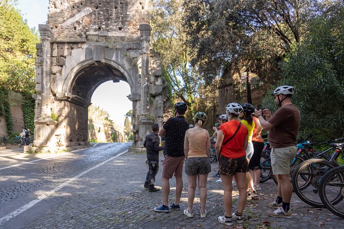 Appian Way & Aqueducts small group e-bike tour(catacombs & food) - The Appian Way riding reality: cobblestones, dirt paths, and Roman traffic