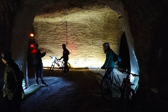Appian Way Bike tour Underground with Catacombs & Lunch - The 40-Foot Descent: Roman Quarry, Catacomb Tunnels, and WWII Shelters
