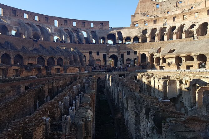 Colosseum Guided Tour and Ancient Rome - Foro Romano in 15 Minutes: Roman Street Energy and Core Ruins Access