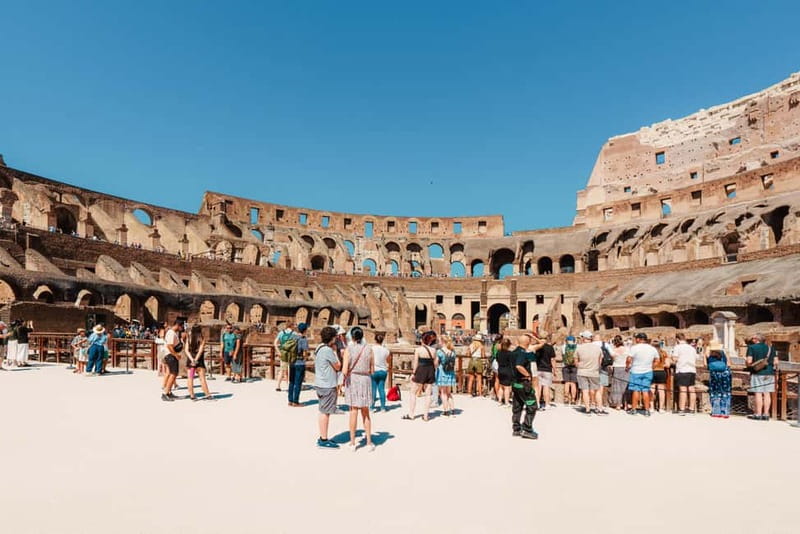 Colosseum & Roman Forum Entry with Audio Guide - Via della Polveriera check-in, find the purple flags fast