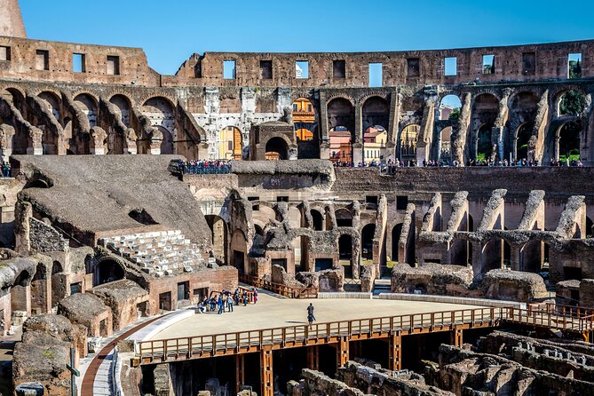 Colosseum Underground Tour and Access to Forum and Palatine Hill - Entering the Colosseum experience from the tunnels below