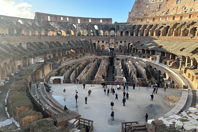 Colosseum with Roman Forum & Palatine Digital Audio Guided Tour - Entering the Colosseum: Levels, Underground Views, and Crowds