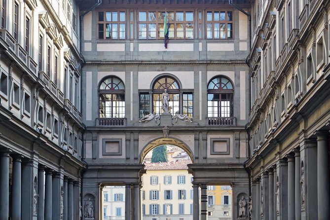Florence Day Trip from Rome by Fast Train with Uffizi & Accademia - Florence walking highlights: Ponte Vecchio, Baptistry, Brunelleschi dome, and David