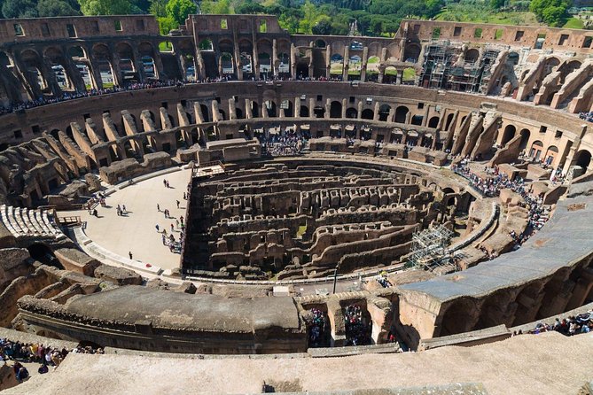 Gladiators Arena Tour with Colosseum First Level & Ancient Rome - Roman Forum Stop: Temples, Julius Caesar, and the Center of Old Rome