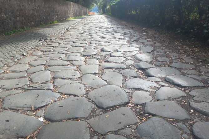 Golf Cart Driving Tour in Rome: 2.5 hrs Catacombs & Appian Way - Leaving the city through the ancient St. Sebastian door