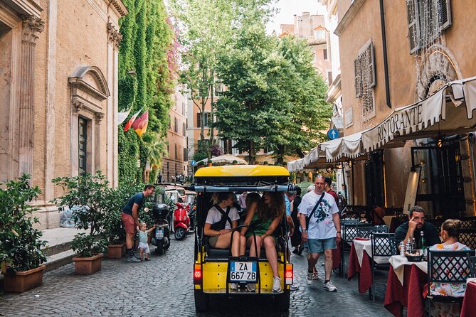 Golf Cart Small-Group Guided Tour: Rome City Highlights - Hearing the guide: headsets make the whole tour work