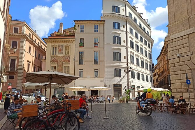 Jewish Ghetto & Piazza Navona: Food, Wine & Sightseeing Rome Tour - Piazza Navona at night: Pompey Theatre views and a calmer rhythm