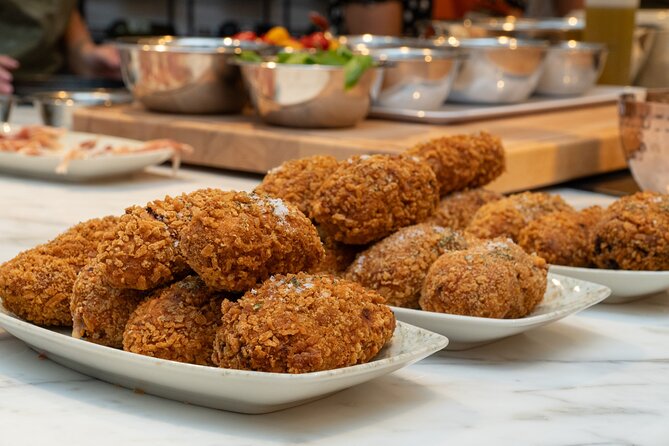 Pizza, Gelato & Suppli Cooking Class by Colosseum - Roman supplì: crispy outside, melted mozzarella inside
