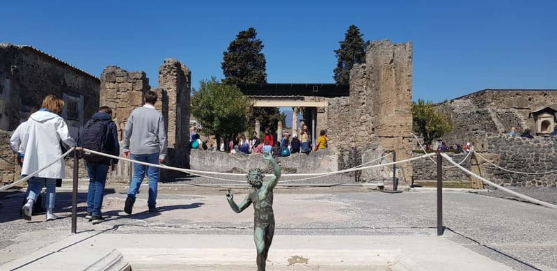 Pompeii: Entry Ticket w/ Guide and Transfers or Audio Guide - Baths, bakeries, and shops: what daily Roman life looked like