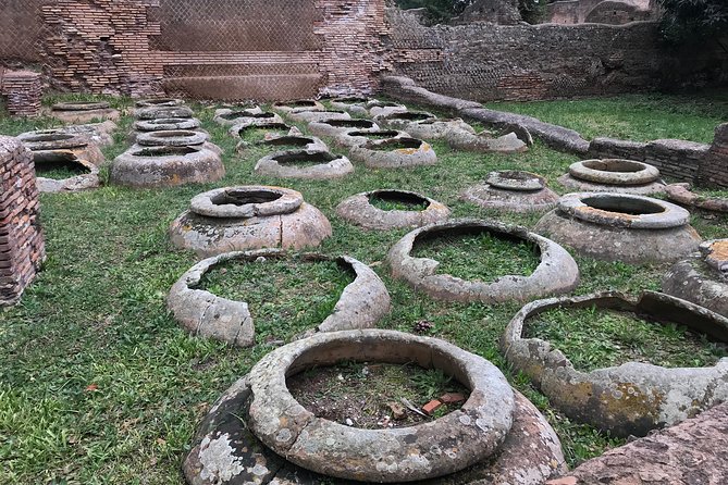 Private tour of Ostia, the ancient city harbor, by van with a PhD archaeologist - Baths, taverns, and insulae: where daily life comes alive