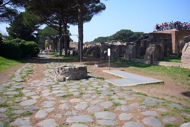 Private tour of Ostia, the ancient city harbor, by van with a PhD archaeologist - Theater, square of the guilds, and the city’s public rhythm