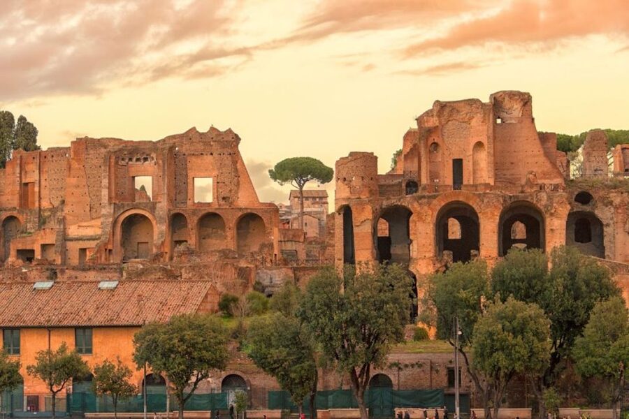 Rome: Colosseum Arena and Ancient Rome Guided Tour - Roman Forum walkthrough: government buildings, markets, and temples