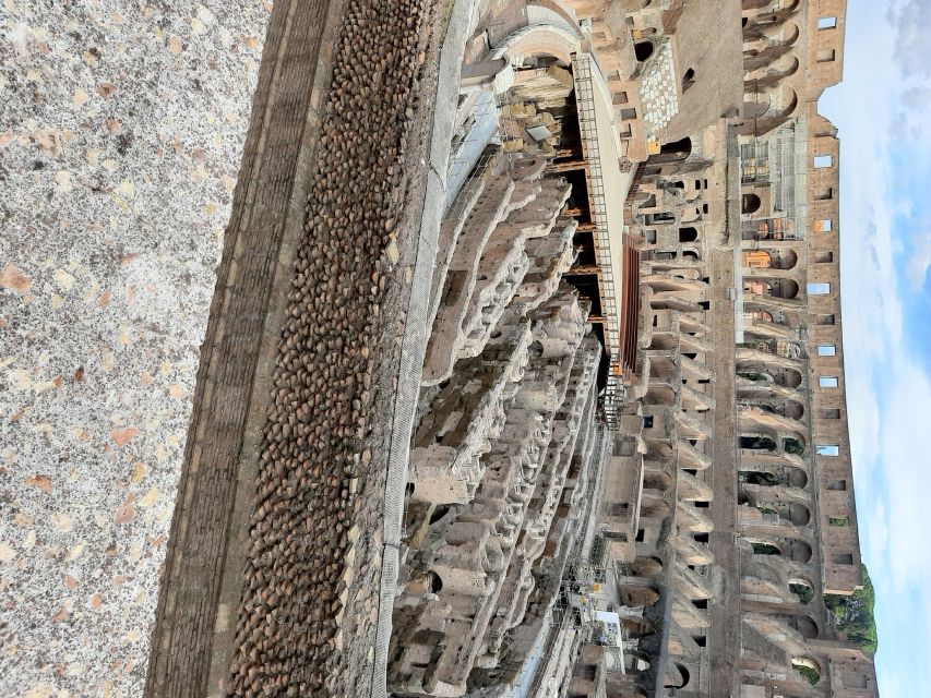 Rome: Colosseum Arena Private 1.5 hour Tour - Arena floor viewpoint, imagining the gladiator’s stance