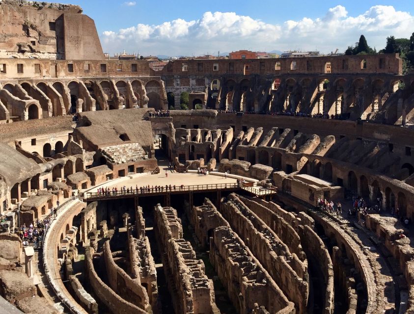 Rome: Colosseum, Roman Forum, and Palatine Hill Tour - Entering the Colosseum: what you get by doing it guided