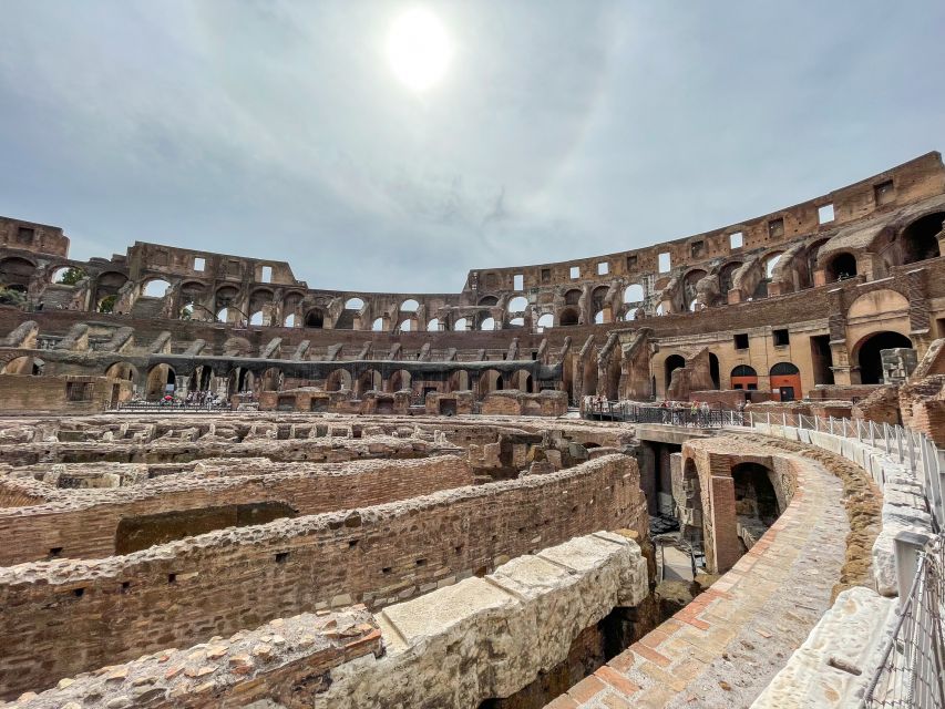 Rome: Colosseum Tour with Access to the Gladiator Arena - Arena Floor Access: Libitina, the Steps, and the Podium Moment
