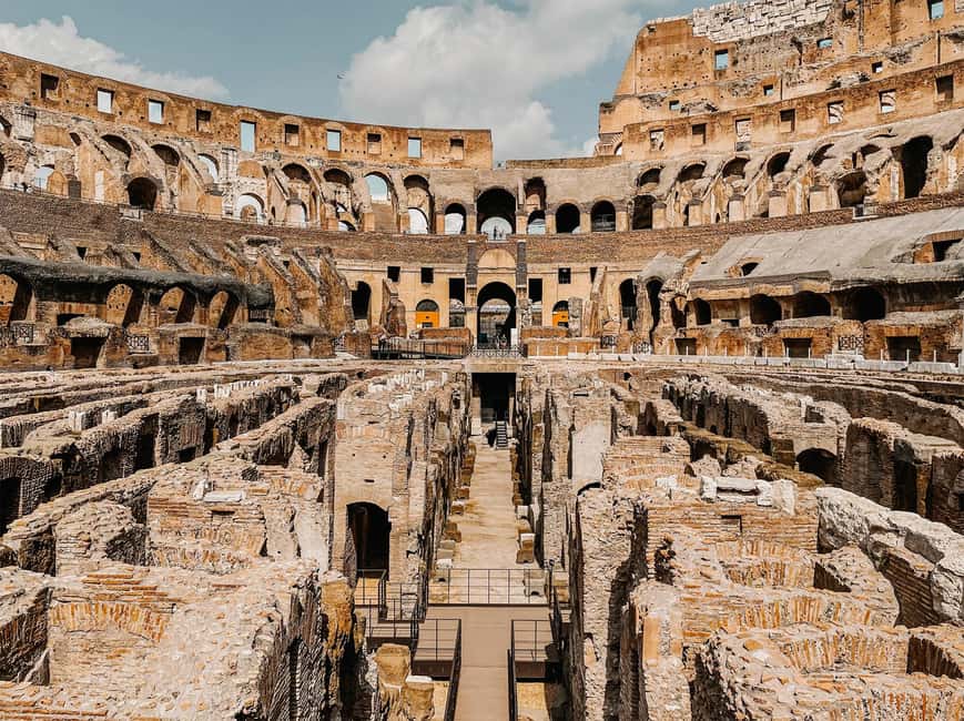 Rome: Colosseum Underground and Arena Tour - The Hypogeum: gladiators’ corridors, travertine blocks, and cages