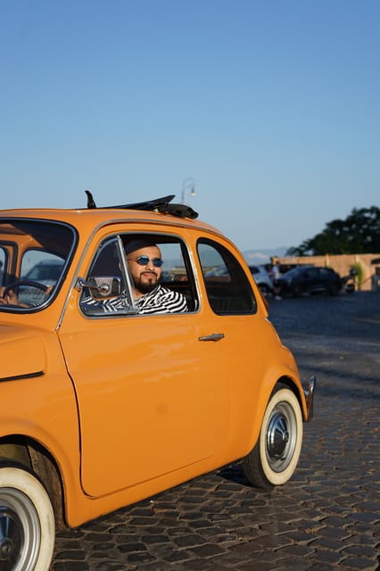 Rome Fiat 500 Tour with Professional Photoshoot - Circus Maximus and Piazza Venezia: Seeing Scale in the Pass-By Moments