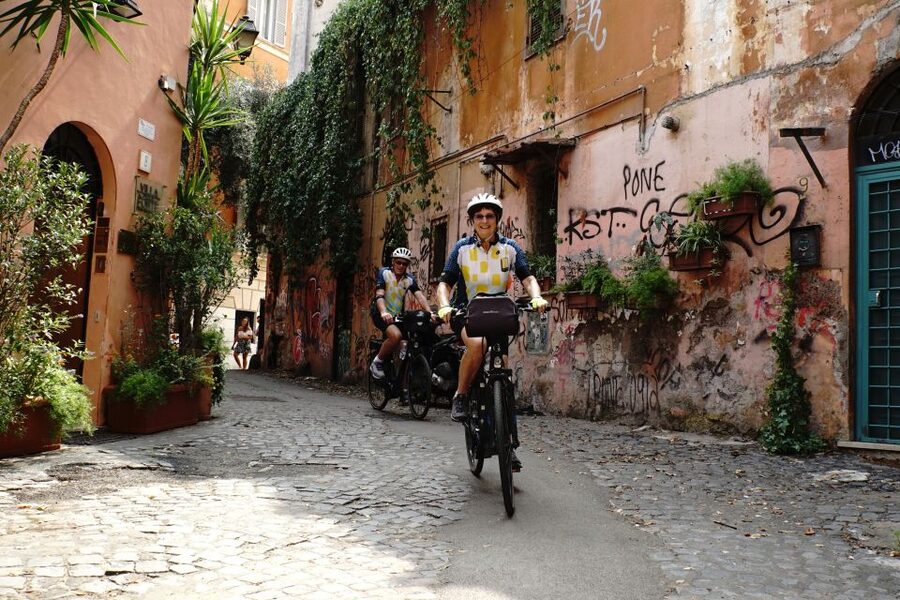 Rome: Full-Day Guided Tour by E-Bike with Lunch Included - Rolling Out From Via Labicana Toward the Colosseum