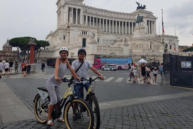 Rome: Highlights Bike Tour - Trajan’s Column and Piazza Venezia: the street-route version of museum context