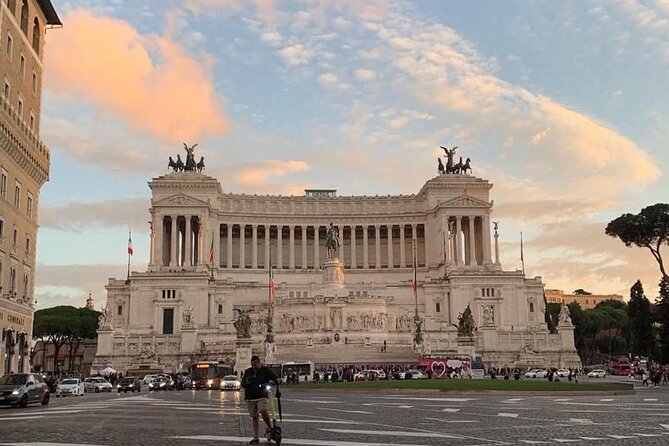 Rome in Golf Car a Private Trip between History and Beauty - Piazza Venezia and the Colosseum area: orientation plus big-city context