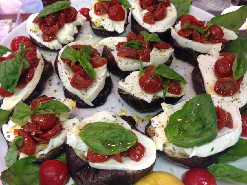 Rome: Italian Food and Wine Guided Tasting Experience - What you actually taste: truffle, balsamic, pesto, olive oil, and the classics