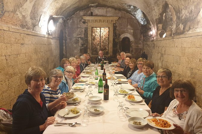 Rome Jewish Ghetto Food & Wine Tour & Guided Visit of Top Sites Lit Up at Night - Largo Argentina ending: gelato near Caesar’s assassination site