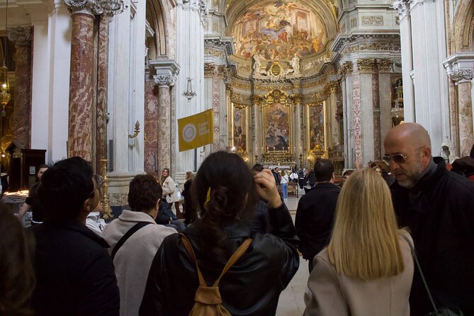 Rome Jubilee Walking Tour of Churches, Bridges & Legends - Stop 3: Basilica of Saint Mary of Minerva and art with strong ties