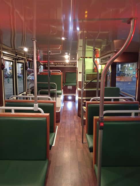 Rome: Nighttime Tour by Open-Top Bus with Tasting Stop - Piazza Venezia and the Colosseum night photo stop