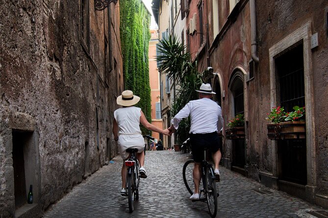 Rome's Best by E-bike: Guided City Tour (Small Group or Private) - Tiber Cycle Path Start, Bridge Cross, and Mouth of Truth Photos