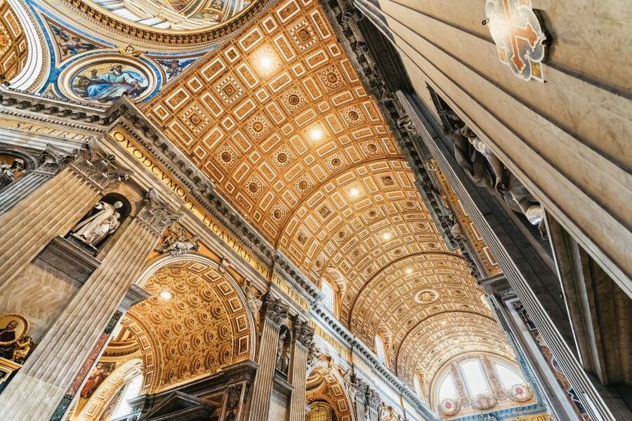 Rome: St. Peter's Basilica, Papal Tombs, and Dome Climb Tour - Underground time: Vatican grottoes and touching the ancient walls