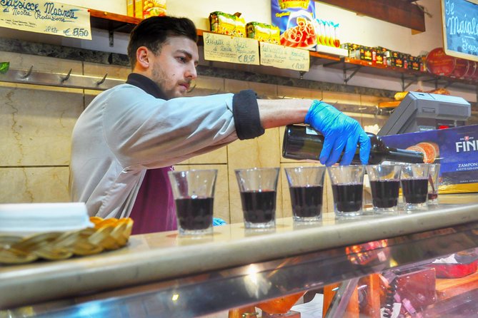 Rome: Trastevere Food Tour Wine Tasting and Local Expert Guide - The Tiber area walk: Tiber Island, bridges, and sweet-salty stops
