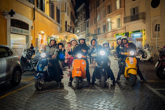 Rome Vespa tour with Pro Photographer - Stop 1: Colosseum area, quick stroll, big photo payoff