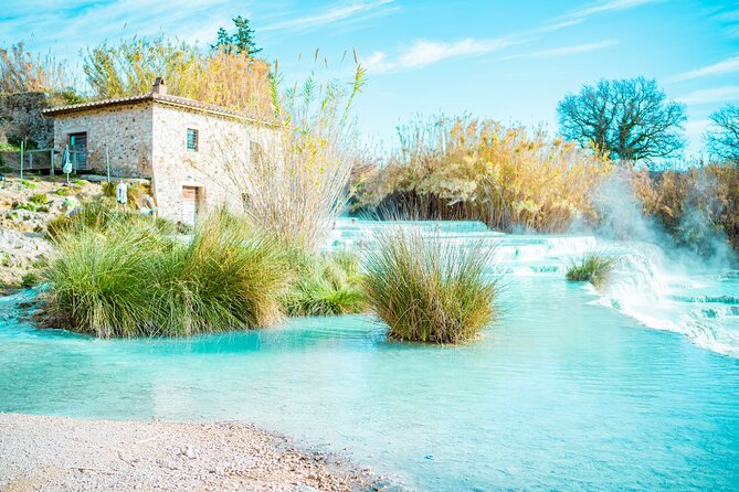 Saturnia Thermal Spring Small Group Day Trip from Rome with Lunch - Inside Terme di Saturnia: 37°C Water, Robes, and Photo Time