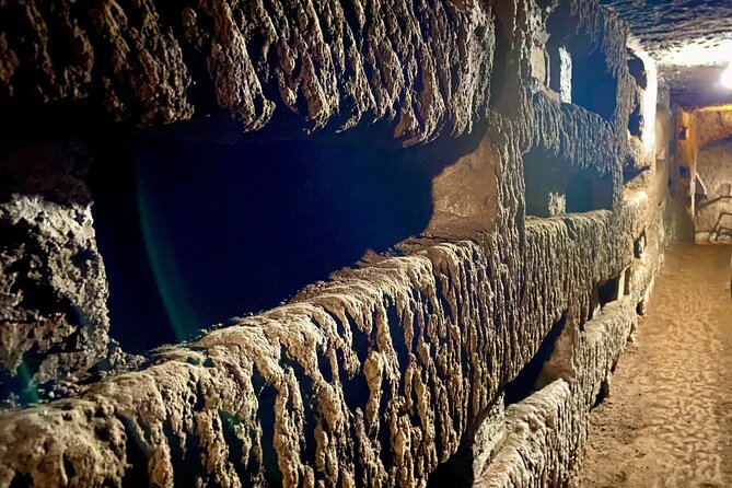 Small Group Express Tour of Roman Catacombs with Transfer - Four levels below ground, with fresco stories that connect pagan and Christian Rome