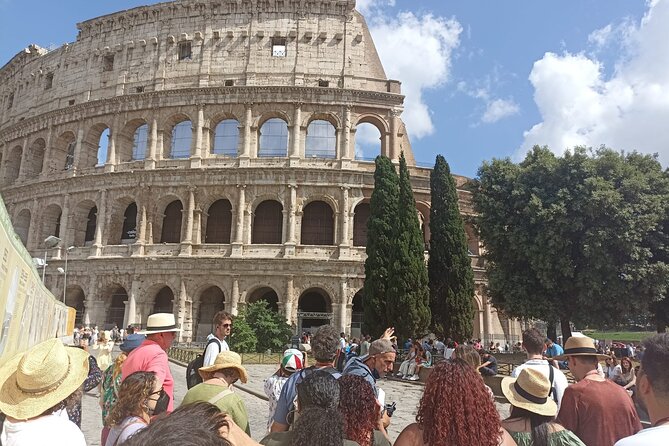 Small Group Guided Tour to the Colosseum, Roman Forum and Palatine Hill - Entering the Colosseum: rings, terrace views, and the guided flow