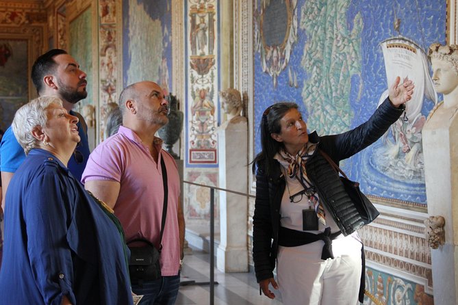 Spanish Small Group Tour of the Vatican Museums, Sistine Chapel & St. Peter's - St. Peter’s Basilica highlights: Pietà, Bernini’s baldachin, and Michelangelo’s dome