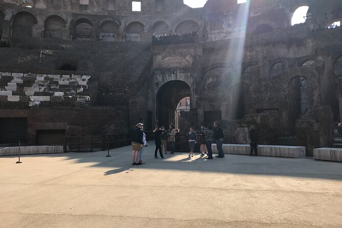 Supersaver: Colosseum Express with Arena and Vatican Museums sharing tour - Entering The Colosseum Arena and Following the Ancient Footsteps
