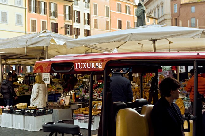 Tour of Rome in Golf Cart: Squares and Fountains of Rome - Meeting at Via dei Condotti, the luxury runway to start from