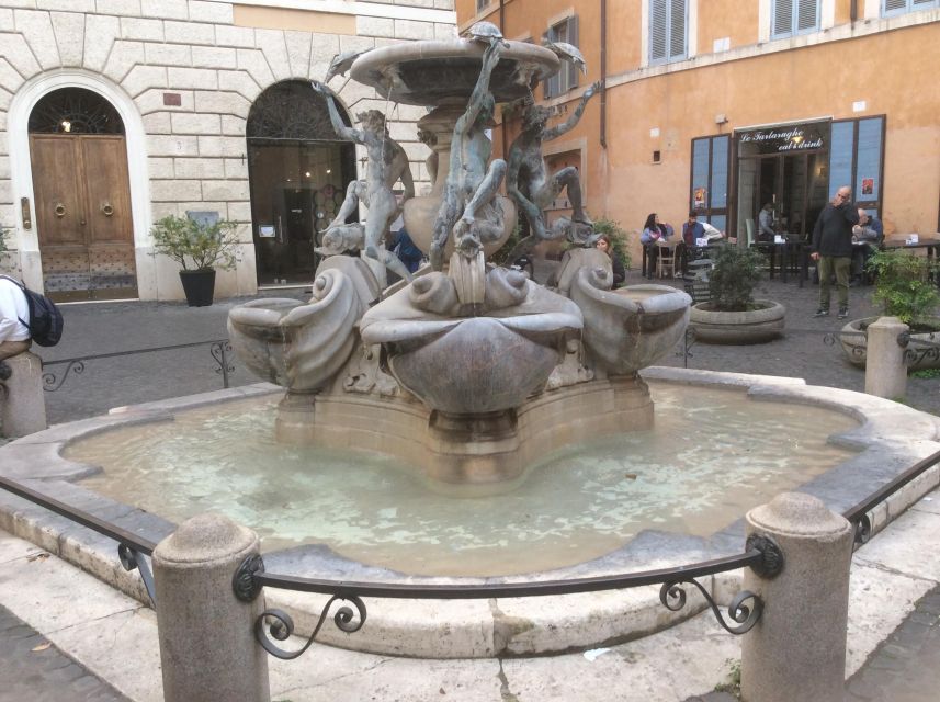 Trastevere Food Tour Prime Edition - Sitting together in Trastevere with an orange spritz