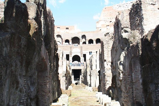 Undergrounds Areas Colosseum and Roman Forum Small Group Tour - Your guide and the headsets: how you actually hear the stories