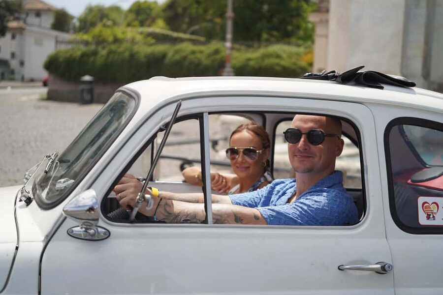 Vintage Fiat500 car Tour by Professional Photographer - Colosseum photo stop, then the classic car rhythm